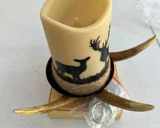 Lot 97: Rustic deer silhouette candle with antler wall mount