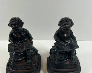 Lot 88: Antique Bookends - Pair of seated child reading figurines
