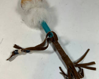 Lot 15: Navajo Style Handmade toy with round wooden disk, fur tuft, turquoise shaft, and leather fringe