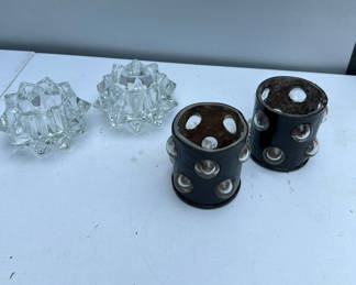 Lot 134: Crystal starburst candle holders and black cylindrical candle cups