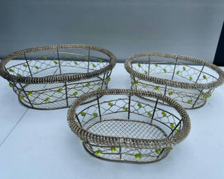 Lot 111: Set of three metal wire baskets with beaded trim