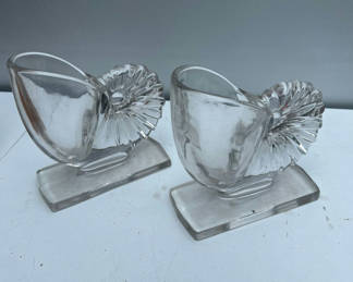 Lot 141: Pair of clear glass holders with fluted backs