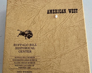 Lot 37: Western-themed coaster set with Buffalo Bill Historical Center packaging