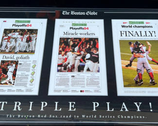 Lot 62: Framed Boston Globe front pages commemorating the 2004 Red Sox World Series victory 16" x 8"