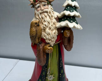 Lot 122: Santa Claus statue with candle wreath, owl, and snow-covered tree