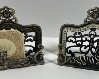 Lot 66: Ornate metal animal-themed card holders (leopard and zebra)