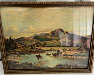 Lot 98: Framed mountain landscape with river and wagon train