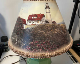 Lot 4: Green ceramic table lamp with lighthouse shade