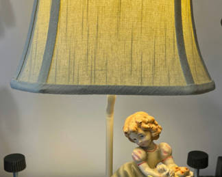 Lot 1: Italian porcelain table lamp with girl figurine and rabbit