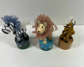 Lot 70: Three wooden FINGER PUPPETS animal figurines (zebra, lion, and dog) on painted bases