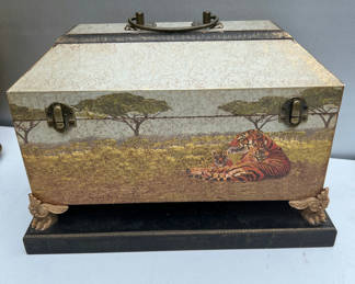 Lot 125: Tiger-themed decorative storage box with brass clasps and ornate feet