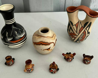 Lot 49: Assorted southwestern ceramic vases and small decorative vessels with geometric motifs