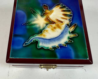 Lot 16: Decorative hinged jewelry box with marine motif