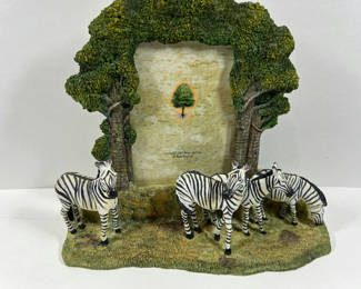 Lot 67: Zebra Figurines in a Grass-Diorama with Tree Arch