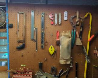 Assorted Vintage Hand Tools on Pegboard
