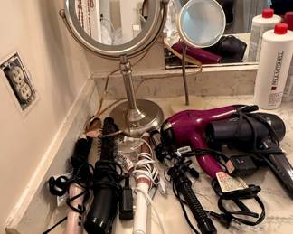 Assorted Hair Styling Tools and Vanity Mirrors with Paul Mitchell Products