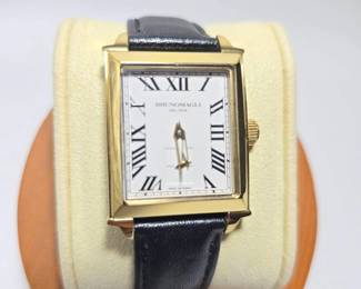 - SEO Title: Bruno Magli Rectangular Gold-Tone Wristwatch – Roman Numeral Dial with Black Leather Strap