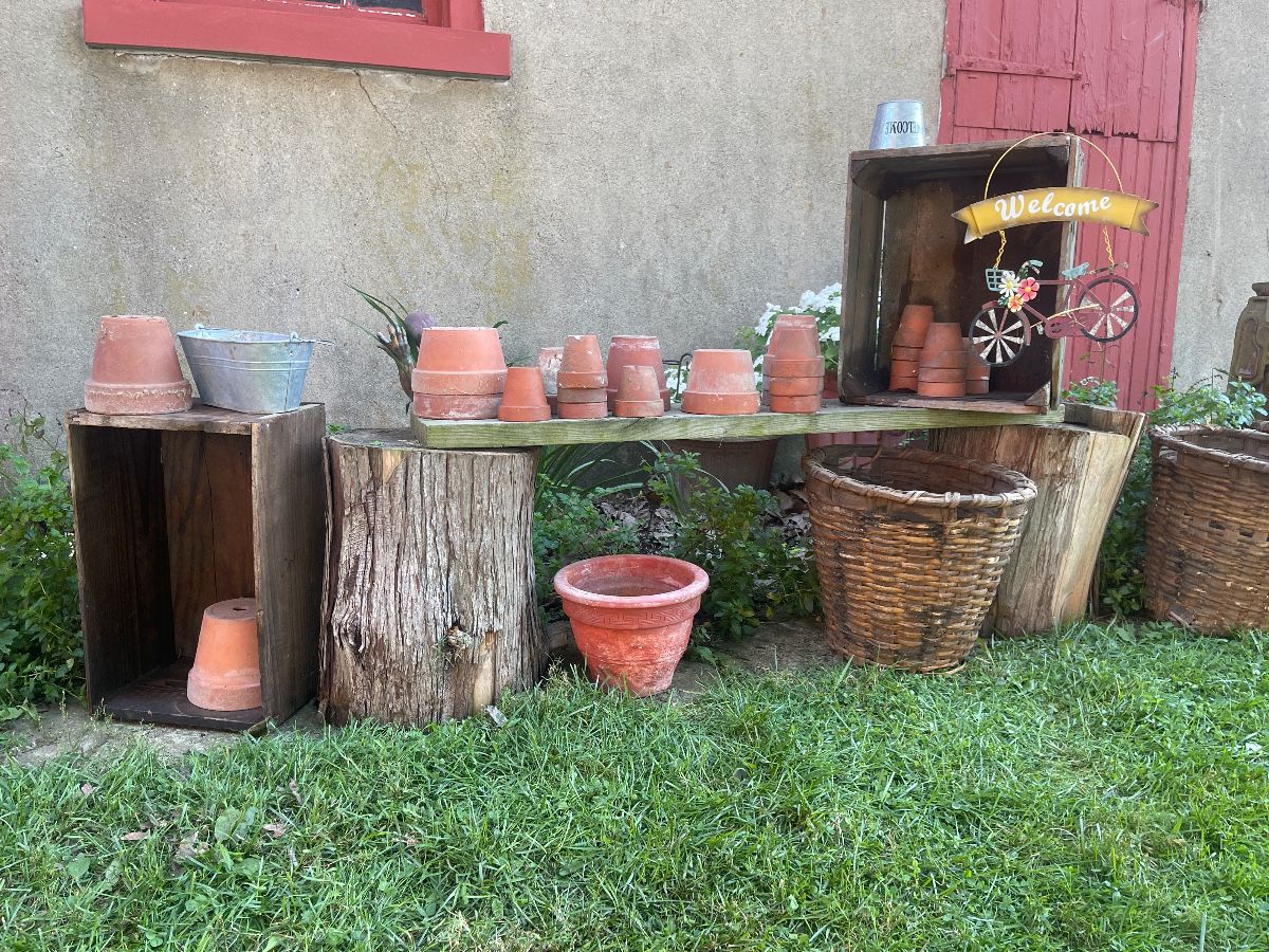 Pots, wooden crates & lots of garden items! More than what is pictured. 