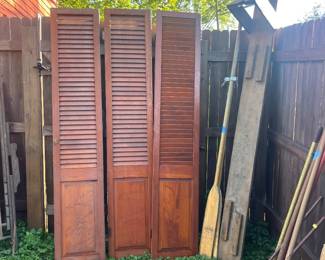 Vintage doors, oars, tools and some old wooden thing that we have no clue what it is. 