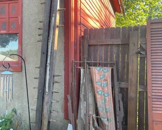 Old telephone pole tops, antique beach chairs and much more! (Shepherds hook & wind chimes NFS)