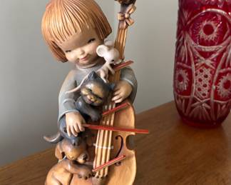 "The Quintet",  ANRI Cello Player designed by Juan Ferrandiz 