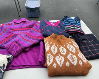 Over 100 fall and winter sweaters in sizes Small to extra large