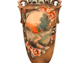 antique hand-painted ceramic or porcelain vase, consistent with early 20th-century Japanese [12] Nippon or Royal Nippon Nishiki production (circa 1891–1921), featuring an Art Nouveau pastoral landscape medallion, double scroll handles, and floral and geometric accents.