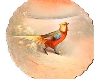 vintage hand-painted Limoges porcelain collector plate featuring a colorful golden pheasant against a soft, scenic background