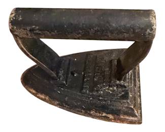 antique children's sad iron antique cast iron sad iron, specifically appearing to be a historic Silvester's Patent model featuring a number "1" size mark and patent lettering embossed on the metal base.