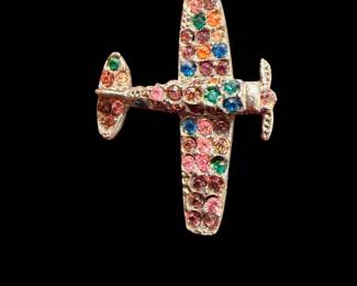 vintage airplane brooch embellished with a colorful multi-colored rhinestones