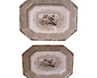 two antique octagonal transferware platters, likely originating from 19th-century Staffordshire, England, featuring a brown pastoral landscape scene surrounded by an ornate stippled and floral border.
