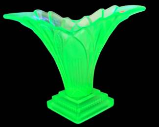 vintage Art Deco Walther & Söhne 'Greta' uranium glass vase featuring a vibrant green glow under ultraviolet light and a distinct fan-shaped silhouette.