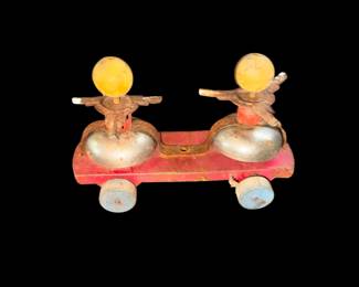 vintage double-bell pull toy, likely manufactured by Marx Toys or a similar mid-20th-century maker.