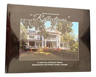 book titled "Reflections: A Collection of Historic Homes, Hawkinsville and Pulaski County, Georgia", published by the Hawkinsville Garden Club. A 144-page coffee table book featuring full-color photos and historical narratives of local homes dating from the 1820s to the 1940s