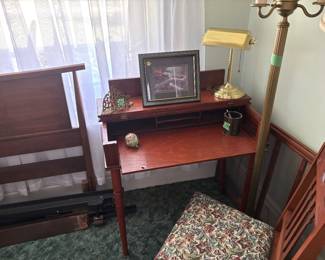 Small desk , side chair with tapestry seat, gold desk lamp, Thomas Kincaid print pic and vintage paper weight and  brass envelope holder