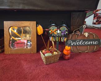Antique Beveled, Framed mirror and various seasonal items.