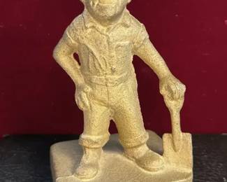 Sandy coal miner figurine doorstop made by Midwest Foundry