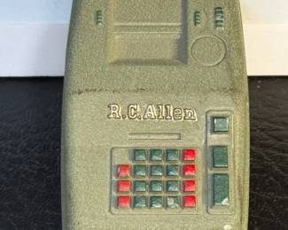 R.C. Allen adding machine paperweight