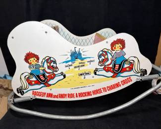 Raggedy Ann and Andy Ride a Rocking Horse to Charing Cross