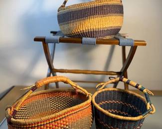 A collection of Bolga baskets luggage rack
