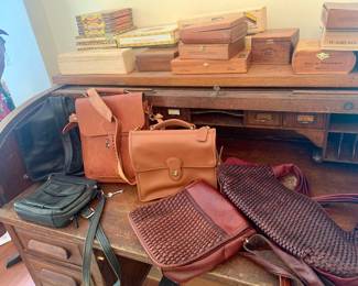 hand made leather goods--notice the wooden cigar boxes