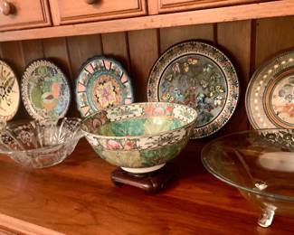 a Famille Rose cabbage leaf punch bowl and a collection of handmade Mexican plates