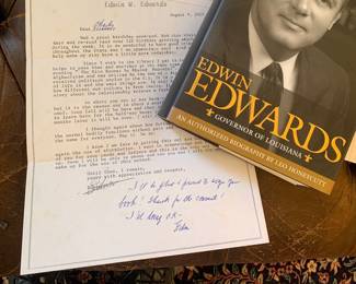 autographed autobiography of Edwin Edwards and a letter written by Edwards from Federal Prison in  Oakdale LA