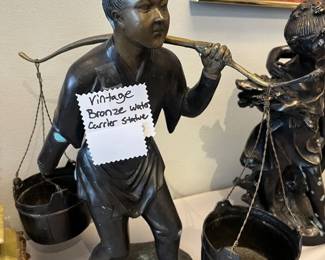 bronze water carrier 