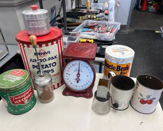 vintage advertising cans and kitchen items 
