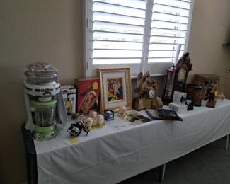 A TABLE FULL OF COLLECTIBLES AND SIGNATURE PAUL MCCARTNEY GUITAR