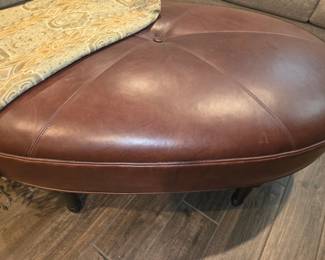 Leather oval ottoman