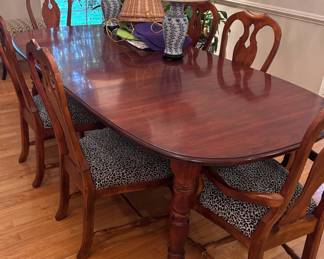 Table with 6 chairs all in excellent condition