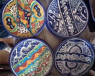 Several Mexican hand painted plates