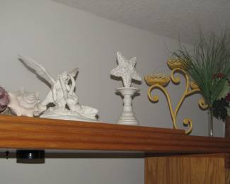 Shells, statues, candle holders